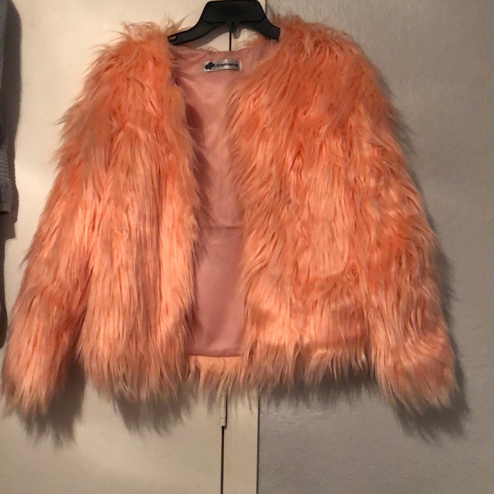 Pink/salmon colored fur coat